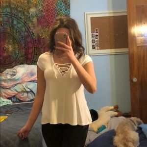 White tshirt with laced criss crossed tie
